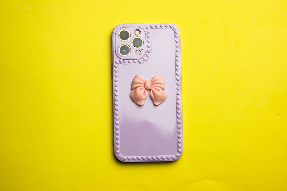 PURPLE BOW DESIGN PHONE CASE. - grip