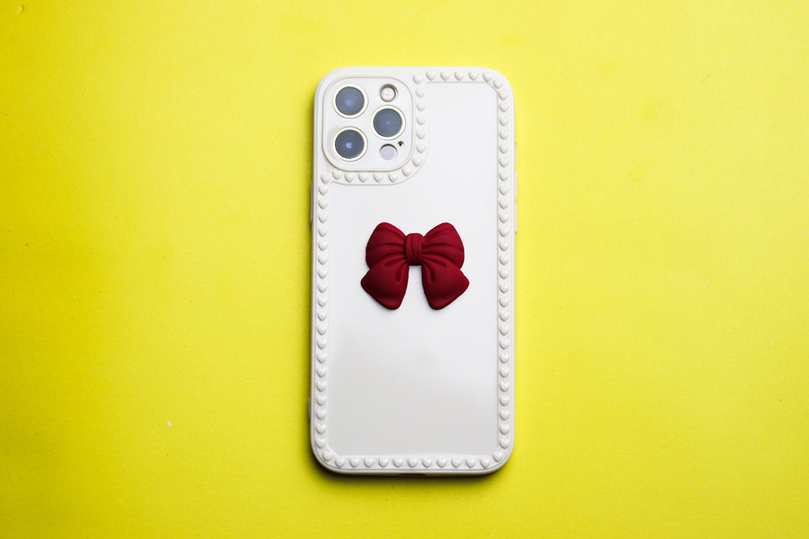 RED BOW DESIGN PHONE CASE. - grip