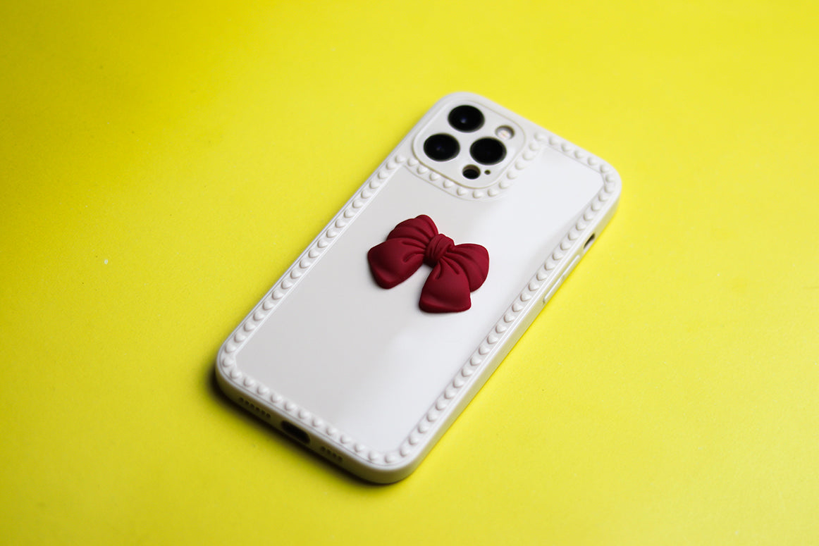 RED BOW DESIGN PHONE CASE. - grip