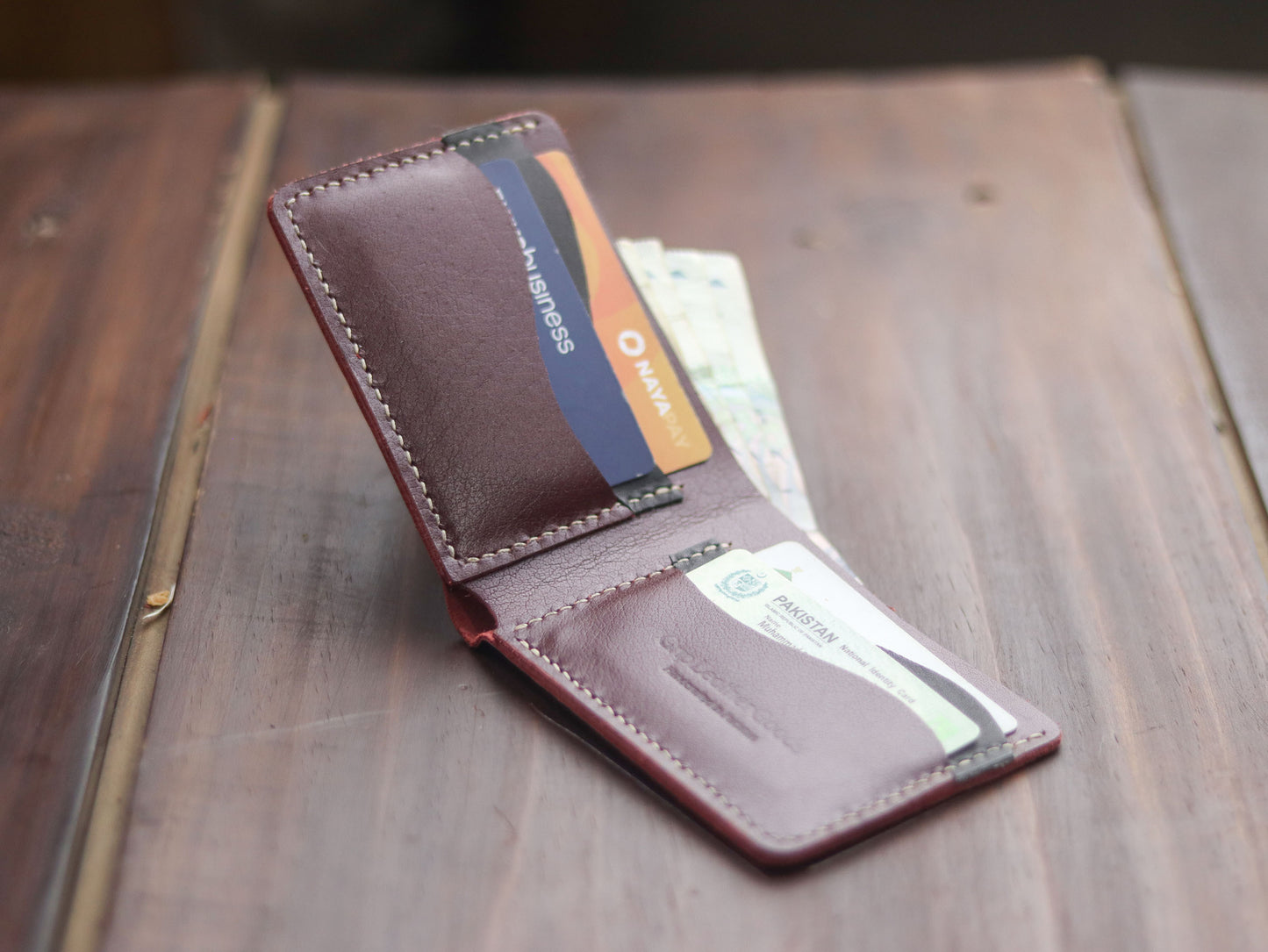 "WAVER" LEATHER BI-FOLD WALLET - MERLOT BURGUNDY - grip