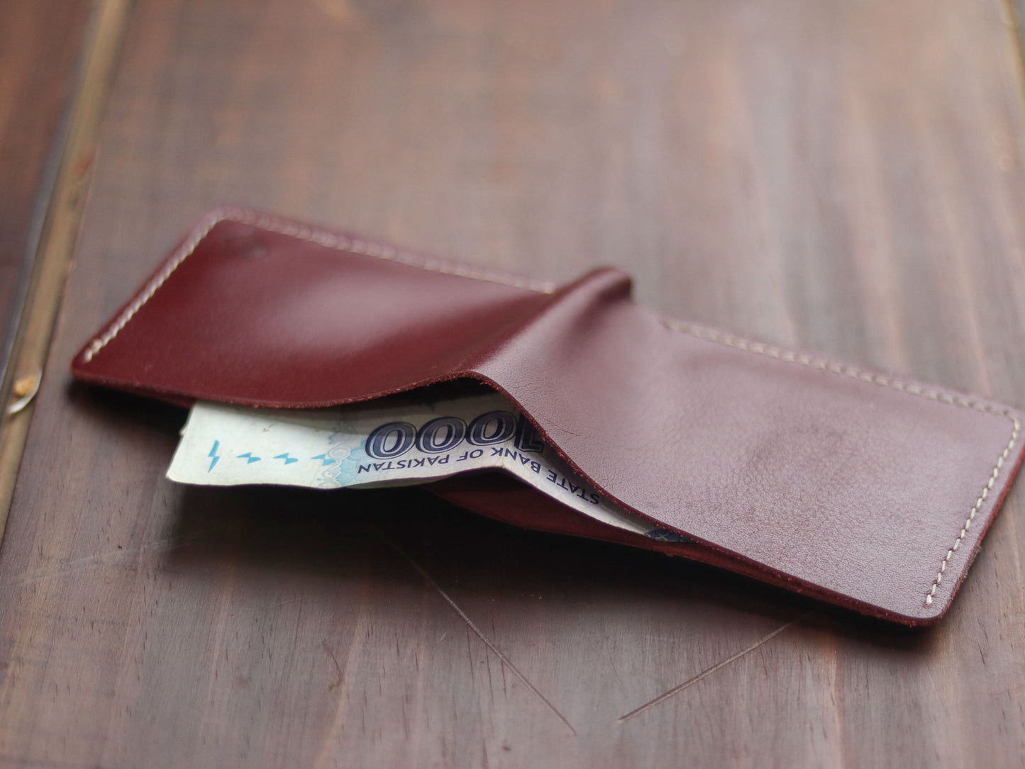 "WAVER" LEATHER BI-FOLD WALLET - MERLOT BURGUNDY - grip